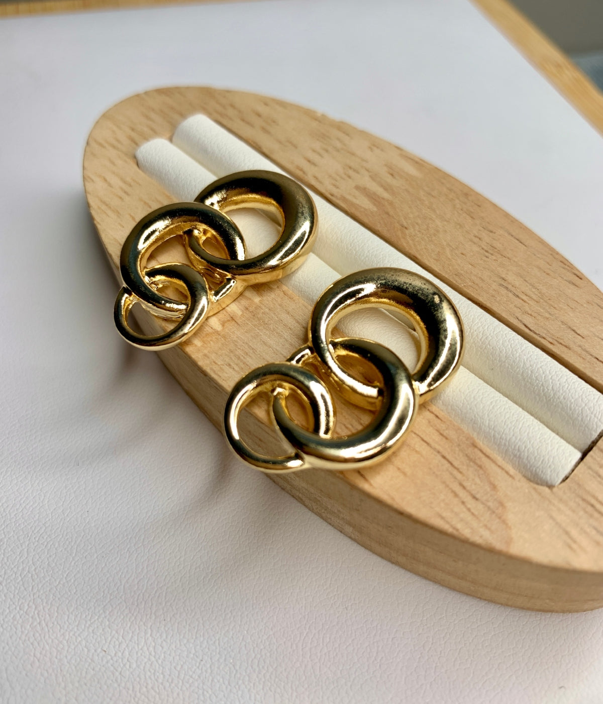Three Small Interlinked Sterling Hoop Earrings