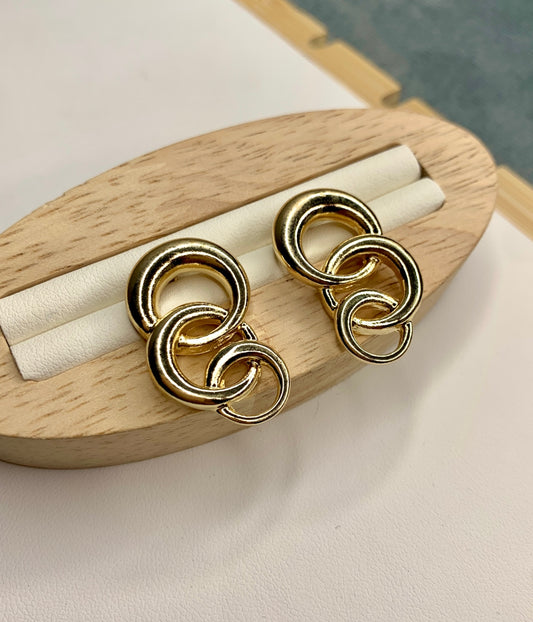 Three Small Interlinked Sterling Hoop Earrings